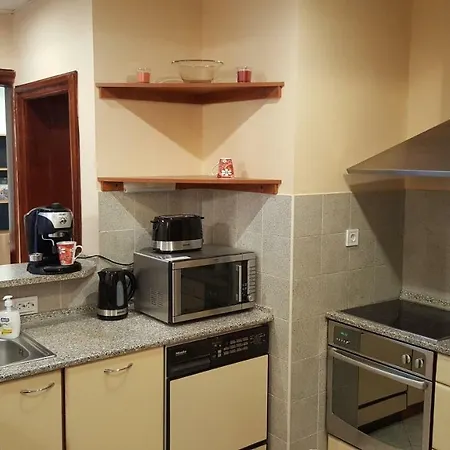 Two Bedrooms Top Center Next To Parking Apartment